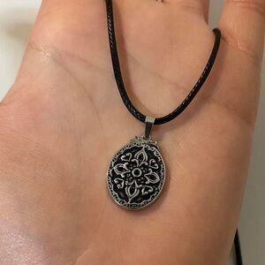 Stainless Steel Oval Flower Pattern Pendant Necklace